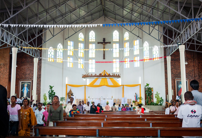 People are leaving from the church after the mass
