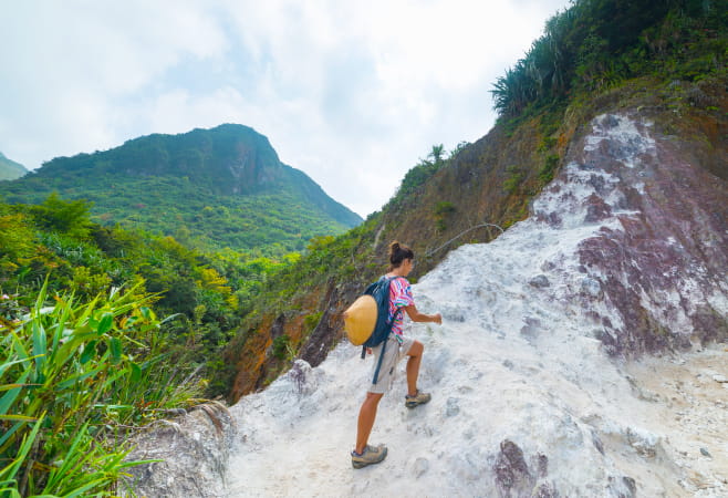 One tourist is climbing Mount Sabyinyo