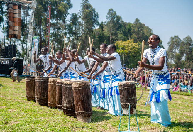Performers are playing Rwandan traditional instruments