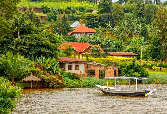 Roof boat anchored at the coast in the background, Kivu lake, Rwanda