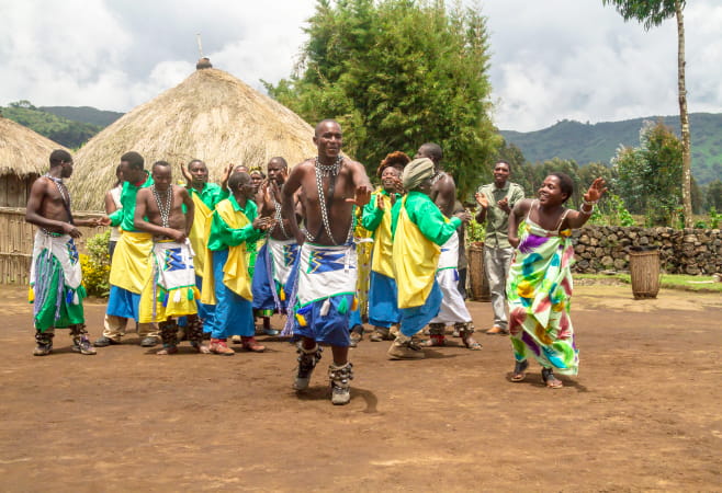 Tribal Dancers of the Batwa Tribe Perform Traditional Intore Dance to Celebrate the Birth of an Endangered Mountain Gorilla